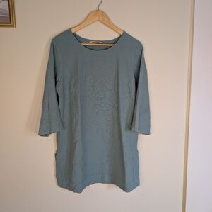 Relaxed and comfortable Soft Surroundings tunic top in light blue.